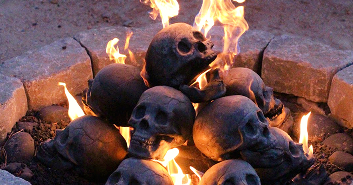 Terrifying Fireproof Human Skull Logs For Your Next Family Camping Trip