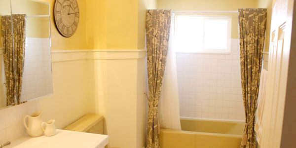 Mustard Yellow Tub and Toilet Updated Bathroom